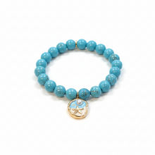 Load image into Gallery viewer, 10mm Blue Howlite w/ Ocean Blue Beach Scene Charm
