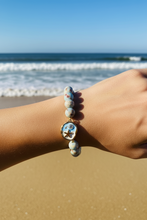 Load image into Gallery viewer, 10mm Light Aqua Terra Jasper with Ocean Blue Beach Scene Charm
