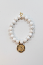 Load image into Gallery viewer, White Howlite Bracelet With Gold St. Christopher Disk
